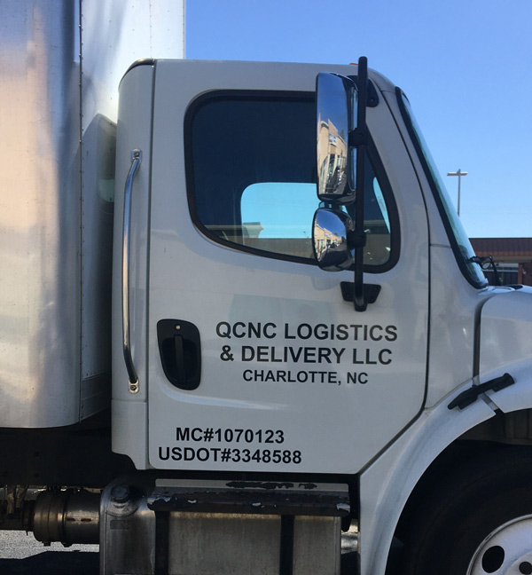 Commercial truck vinyl wraps for QCNC Logistics in Charlotte, NC