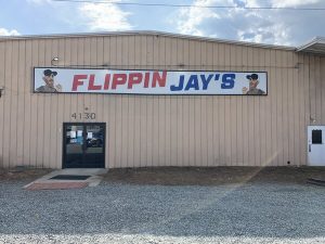 Large storefront sign made for Flippen Jay’s