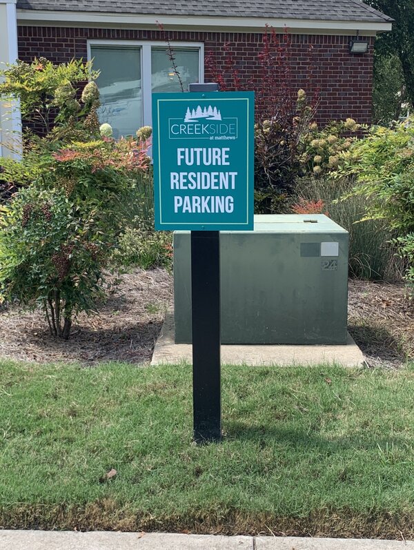 Creek Side custom parking sign in Charlotte, NC by Qc Signs & Graphics